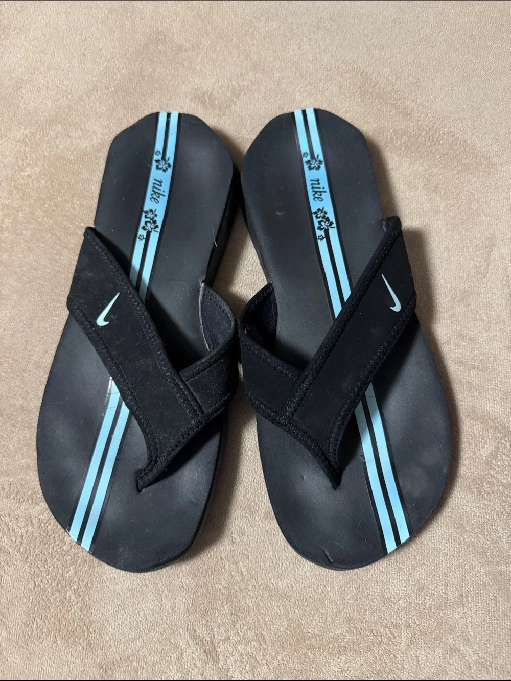 Nike Women’s Black Flip Flops with Light Blue Stripes